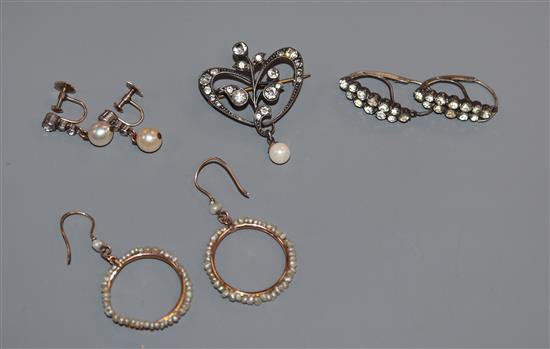 A pair of yellow metal and seed pearl loop earrings, a 19th century paste set brooch and two pairs of paste set earrings.